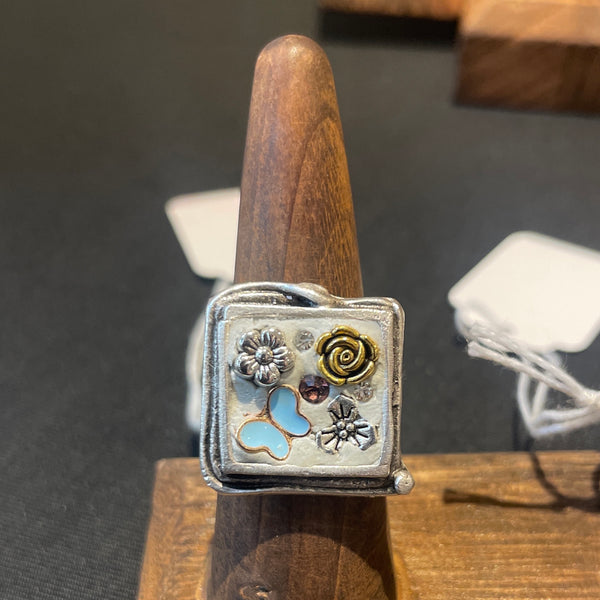 Square bezel with butterfly
