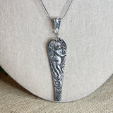 Winged cherub pendant