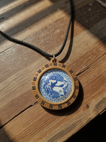 Round wood bezel blue and white tile