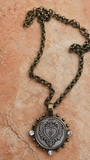 Silver and brass sacred heart